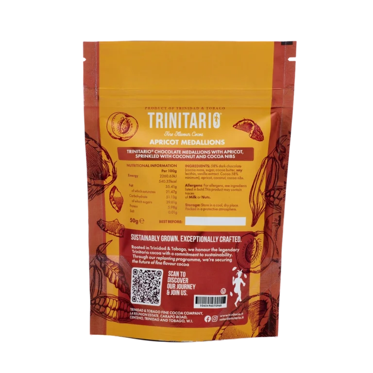 Back of a Trinitario Apricot Medallions pouch featuring nutritional info, ingredients, product description, QR code, and sustainability statement—highlighting single-origin chocolate crafted from Caribbean cocoa on a yellow-orange background. | Trinitario