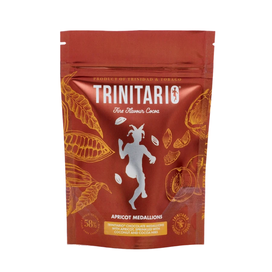 Front view of a Trinitario Apricot Medallions pack featuring cocoa pod illustrations and a central silhouette of a dancing figure, highlighting its single-origin chocolate crafted from sustainably grown cacao. | Trinitario