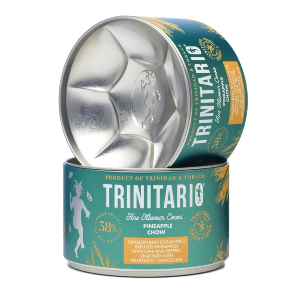 A tin of Trinitario Fine Flavour Cocoa Pineapple Chow with the lid partially open, showcasing its branding and label details. Made with sustainably grown chocolate for a rich and flavourful experience. | Trinitario