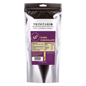 A silver re-sealable bag of 58% Dark Chocolate Callets, 1kg, hand-crafted from Caribbean Trinitario Fine Flavour Cocoa, features a purple label with product details and nutritional information. | Trinitario